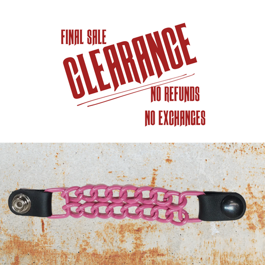 A hot pink chain-link vest chain with black leather ends and metal snap buttons.