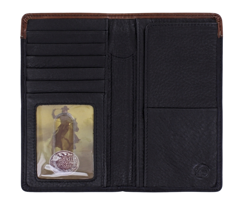 Only a true cowboy would carry this handsome checkbook wallet. Rustic Black with tooled leather, Star concho, rawhide lacing, it's practical, durable, the soft inside is built to fit 6 cards, checkbook, cash slot, pen, ID, and more. It's sized at 6 3/4" tall by 3 3/4" wide. Available in our Smyrna, TN store, a short drive id your in Nashville visiting. Silver Creek is Made by Brighton.