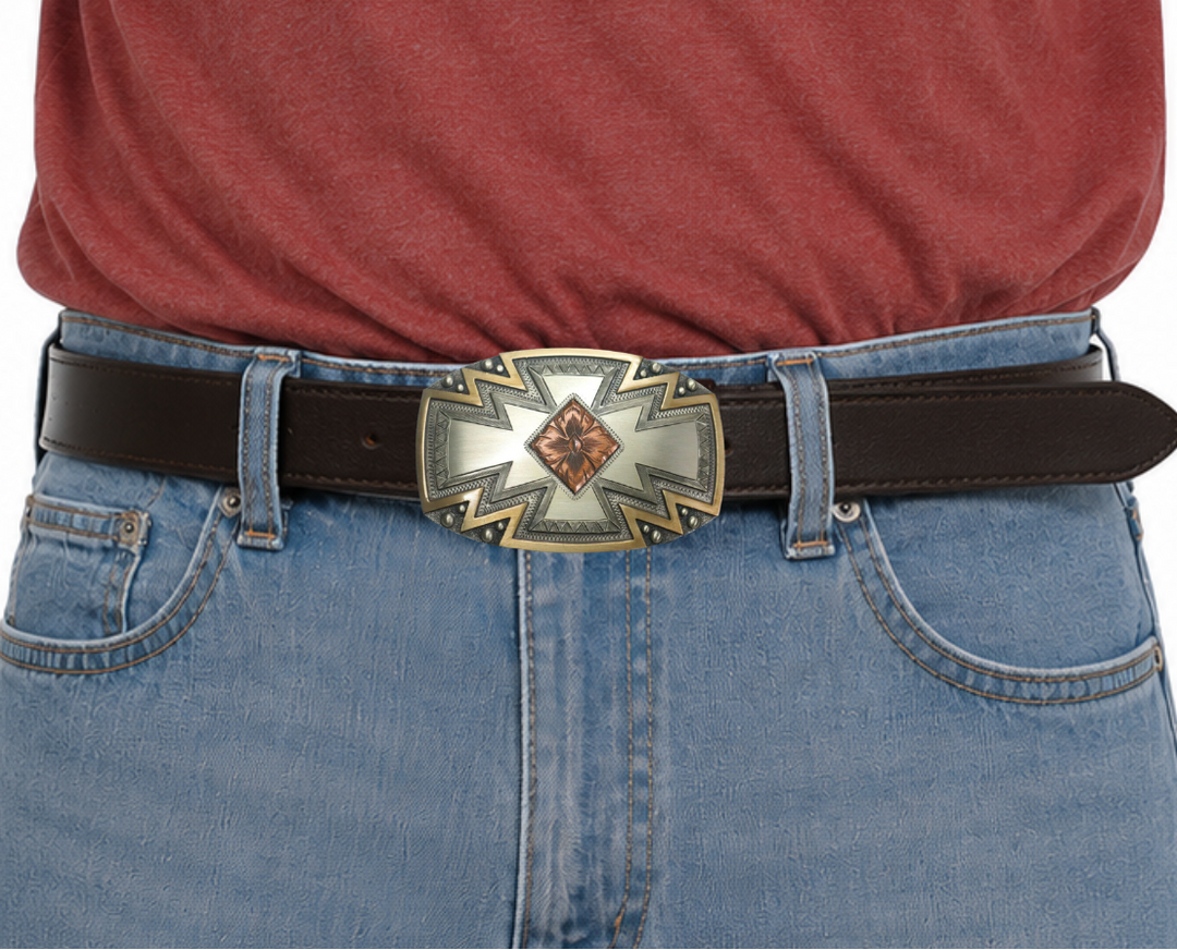 The Radiance Belt Buckle impresses an design idea that results from a bright fire with a Southwestern overtones. Made from German Silver and engraved and layered metals in a tri-color Southwestern design. Available in our Smyrna, TN shop, a short distance from Nashville.

Dimensions: Width 4”, Height 2.7”
Standard 1.5” Swivel