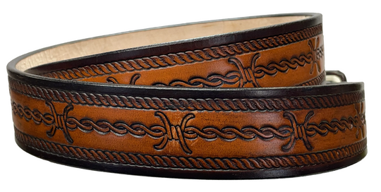 Barb Wire a western-inspired twist to any look. Made from premium veg-tan cowhide and featuring a barb wire icon design, the "Riding Fence" Name Leather Belt is the perfect way to add a touch of rustic  to your wardrobe. Hailing from our Smyrna, TN shop just outside of Nashville, TN, this belt also features an easy-to-swap buckle, so you can keep your style fresh. 