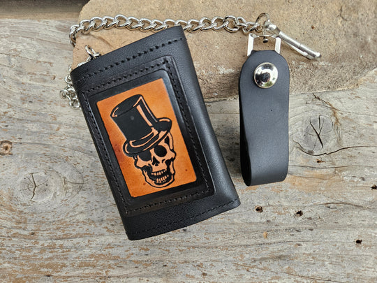Skull Top Hat all leather Tri-fold Chain Wallet. 1 Cash Slot for all your important stash, 3 card slots and 1 underneath the middle slot. It&