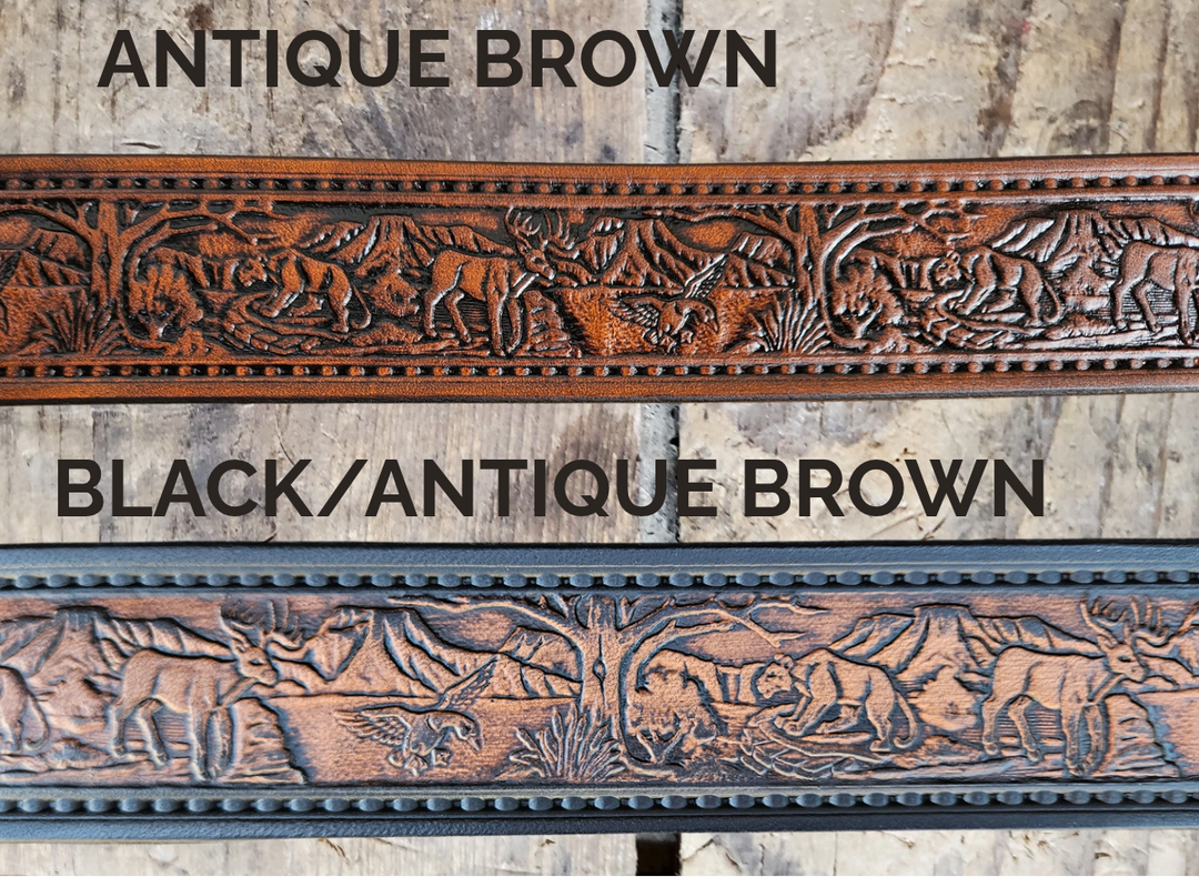 Wilderness leather belt in antique brown, coiled on a rustic wood background. 