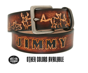 This solid strip of Veg Tan cowhide, is hand stained brown, with smooth, finished edges. Embossed with a classic deer scene down length of belt, or have name added to scene up to 8 letters. Belt thickness is approx. 1/8", and 1 1/2" wide. Sizes available are 34" to 44" from buckle end to hole most worn. Attached with 2 snaps, for easy buckle change, is an antique silver colored buckle. 