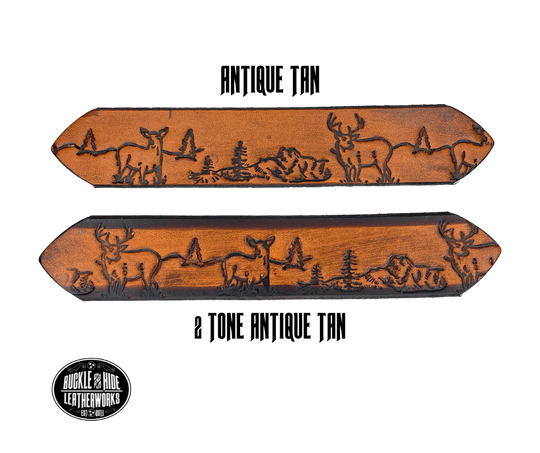 This belt is for the Outdoorsy type with Deer scene embossed onto a solid strip of Veg Tan cowhide, is hand stained brown, with smooth, finished edges. Embossed with a classic deer scene down length of belt, or have name added to scene up to 10 letters. Belt thickness is approx. 1/8", and 1 1/2" wide. Attached with 2 snaps, for easy buckle change, is an antique silver colored buckle. Made just outside Nashville in our Smyrna TN shop.