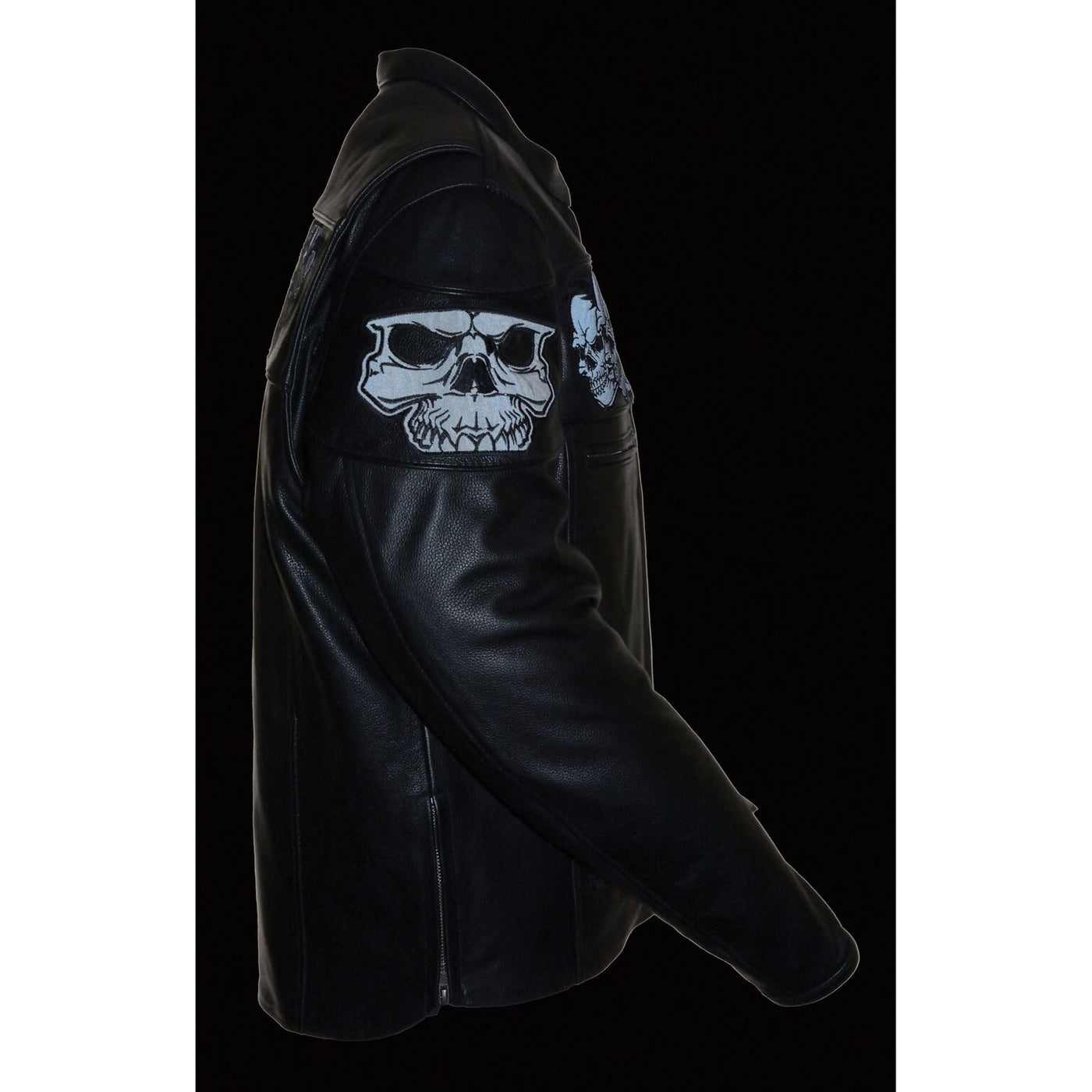 Night time reflective view of black leather riding jacket with skulls pictured around torso. View of side sleeves with skull reflection around upper arm. Sleeves have zippers and snaps at wrists. Available for purchase at our leather shop in Smyrna, TN, near Nashville.