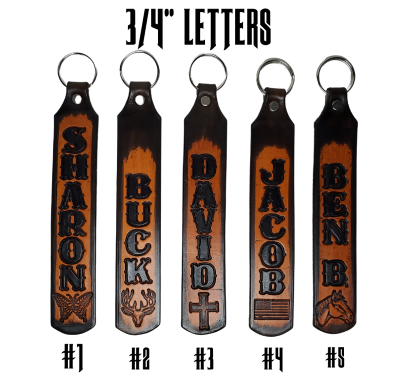 Our Customizable "1975" Longer Leather keychain embossed similar to our popular belts.  Great for identifying luggage, backpacks, or your keys! Available in the below choices All colored in our popular 2 TONE BROWN, pick one or a few. Made in our Smyrna, TN shop. Please type desired name in CUSTOM box.