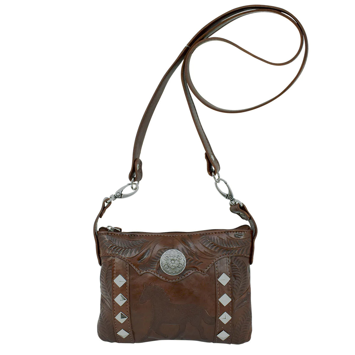 Go from a crossbody to a hip bag in seconds. Hand stained and hand-tooled genuine leather. Exterior & interior slip pockets. Removable strap allows this bag to be worn as a crossbody or on belt loops as a hip bag. Each piece is made by hand, one at a time. Available also in our Smyrna ,TN shop just outside Nashville. Product made in Paraguay by American West.