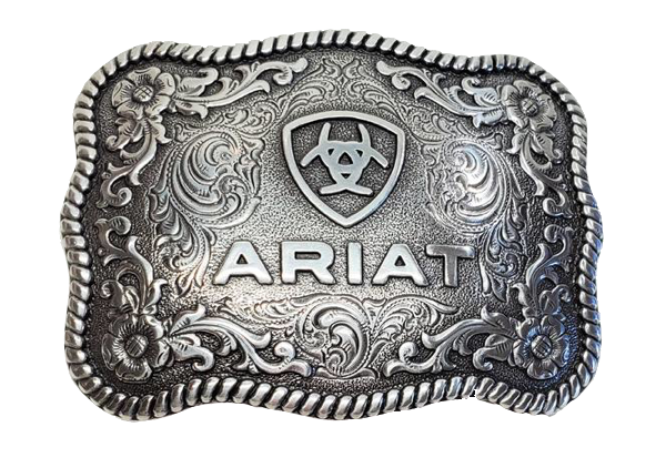 This rectangular shaped buckle has rounded edges and Ariat logo centered on surface. Surface also has scroll and flower designs and rope design around the border of the buckle. Color is antique chrome. Measures 2 1/2" tall by 3 1/2" wide.  Fits belts up to 1 1/2" wide. Available for purchase in our online store or the retail shop in Smyrna, TN, just outside Nashville. Made in Taiwan.