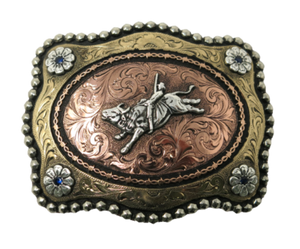 Have you ridden a Mechanical Bull? Even if you have made it 3 seconds and not 8 seconds it qualifies you to wear this Bullrider buckle. This buckle is made from German Silver (nickel and brass alloy) or iron metal base. Some buckles have motifs made of copper, iron or brass and some are adorned with synthetic stones. Our products are all handcrafted. Each piece is punched, cut, soldered, engraved, polished and painted by our talented metal workers. 