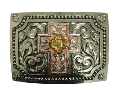 The perfect blend of a Cross with Western Scrolls and accents. This buckle is manufactured using the casting technique and made of Zamak an alloy of zinc, aluminum, magnesium and copper. The mold of each buckle is designed and finished by hand. Each piece is covered with a heat sealed lacquer to ensure the piece's long lasting qualities. Buckle size is Width 4” Height 3” and is made in Mexico. 