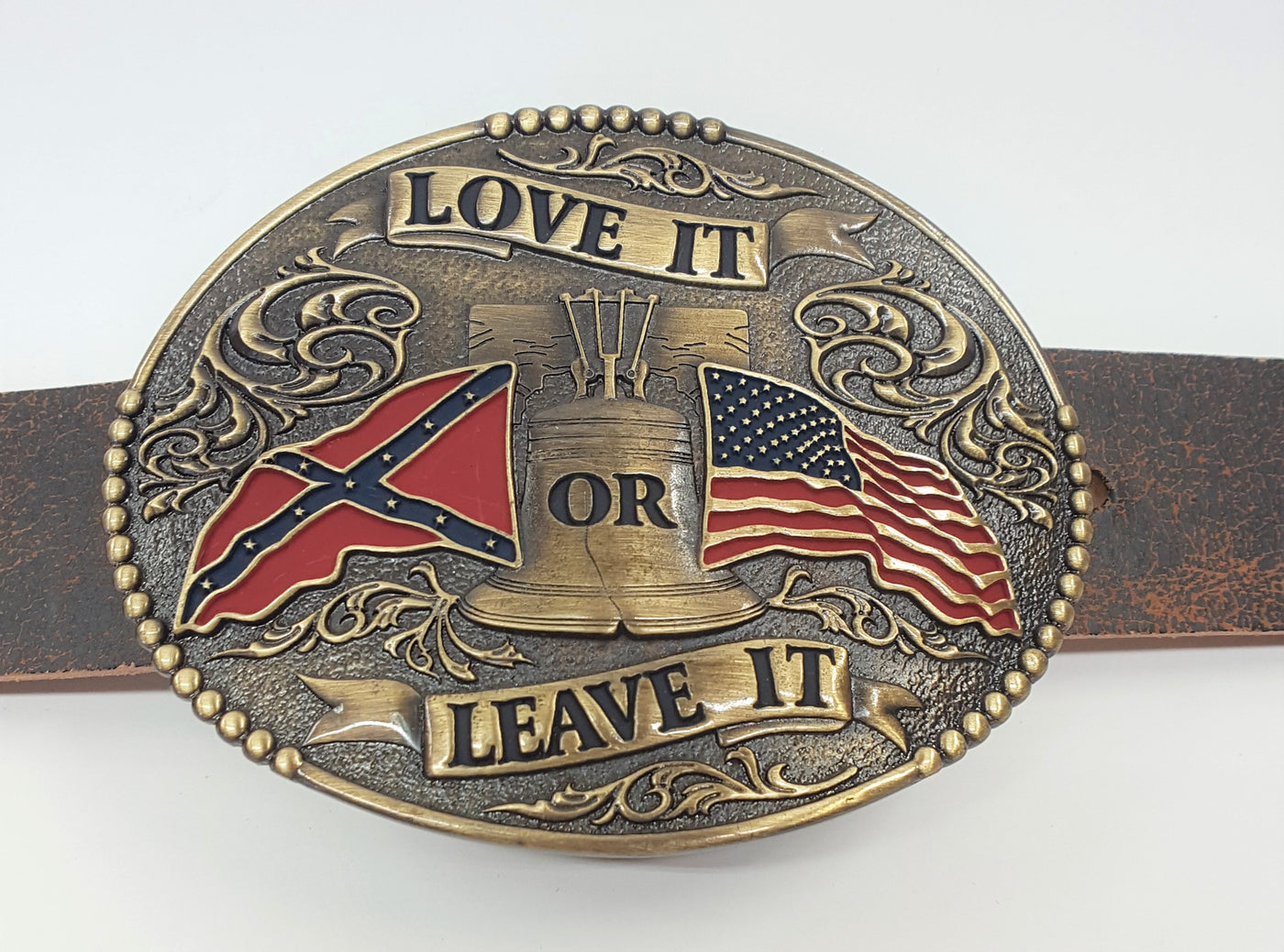 Antique Brass Belt Buckle with Love It or Leave It design Made in Mexico Fits Belts up to 1 3/4" wide Dimensions 3" x 4" Available online and in our retail shop in Smyrna, TN, just outside of Nashville