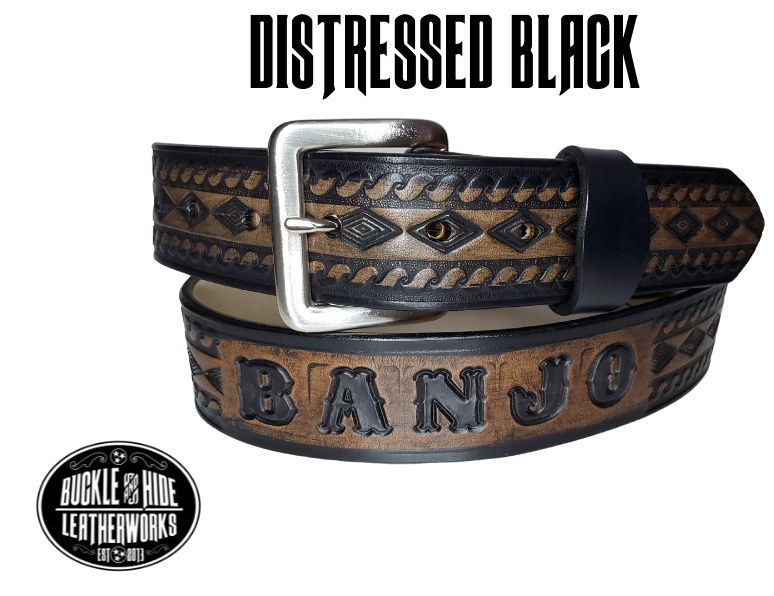 "The Banjo" is a handmade real leather belt made from a single strip of cowhide shoulder leather that is 8-10 oz. or approx. 1/8" thick. It has hand burnished (smoothed) edges and a Diamond center with a rope edge pattern. This belt is completely HAND dyed with a multi step finishing technic. The antique nickel plated solid brass buckle is snapped in place with heavy snaps.  This belt is made just outside Nashville in Smyrna, TN.