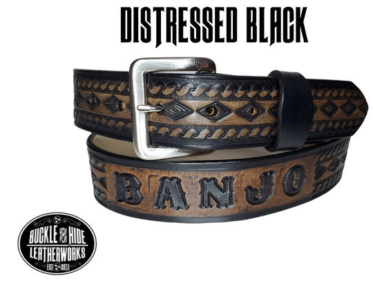 "The Banjo" is a handmade real leather belt made from a single strip of cowhide shoulder leather that is 8-10 oz. or approx. 1/8" thick. It has hand burnished (smoothed) edges and a Diamond center with a rope edge pattern. This belt is completely HAND dyed with a multi step finishing technic. The antique nickel plated solid brass buckle is snapped in place with heavy snaps.  This belt is made just outside Nashville in Smyrna, TN.