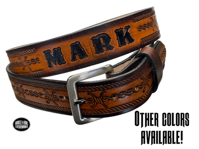 Full grain American vegetable tanned cowhide approx. 1/8"thick. Width 1 1/2" and includes Antique Nickle plated Solid Brass buckle Hand Finished in 3 color options Smooth burnished painted edges Choose with or without name, if without name, design will cover entire length of belt For name Type name desired on belt in "Type Name Here" section, no more than 8 letters maximum Buckle snaps in place for easy changing if desired Made in our Smyrna, TN, USA shop