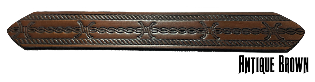 Barb Wire a western-inspired twist to any look. Made from premium veg-tan cowhide and featuring a barb wire icon design, the "Riding Fence" Name Leather Belt is the perfect way to add a touch of rustic  to your wardrobe. Hailing from our Smyrna, TN shop just outside of Nashville, TN, this belt also features an easy-to-swap buckle, so you can keep your style fresh. 