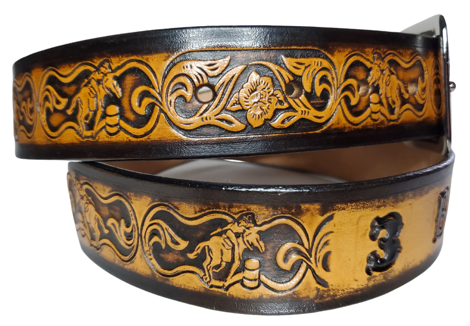 "The Barrel Racer" is a handmade real leather belt made from a single strip of cowhide shoulder leather that is 8-10 oz. or approx. 1/8" thick. It has hand burnished (smoothed) edges and a western influenced Rodeo events pattern. This belt is completely HAND dyed with a multi step finishing technic. The antique nickel plated solid brass buckle is snapped in place with heavy snaps.  This belt is made just outside Nashville in Smyrna, TN.