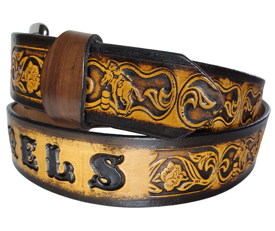 "The Barrel Racer" is a handmade real leather belt made from a single strip of cowhide shoulder leather that is 8-10 oz. or approx. 1/8" thick. It has hand burnished (smoothed) edges and a western influenced Rodeo events pattern. This belt is completely HAND dyed with a multi step finishing technic. The antique nickel plated solid brass buckle is snapped in place with heavy snaps.  This belt is made just outside Nashville in Smyrna, TN.