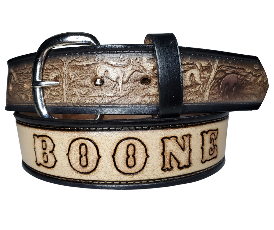 The Outdoorsmen leather belt is a classic Outdoors Pattern with DEER. HOGS, and BASS. perfect the Hunter in your family. Available in a 1 1/2" width. Full grain vegetable tanned cowhide, Width 1 1/2" and includes Nickle plated  buckle Smooth burnished painted edges. Made in USA! For name Type name desired on belt in "Type Name Here" section, no more than 8 LETTERS maximum on this PARTICULAR belt. Buckle snaps in place for easy changing if desired. In stock at our Smyrna, TN shop.