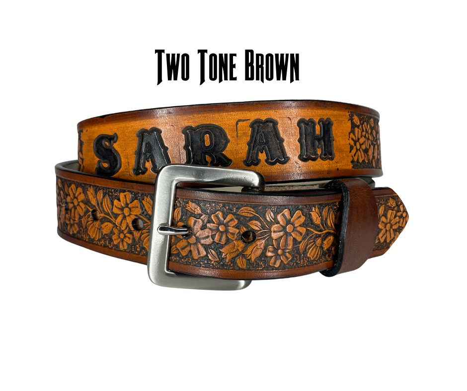 "The Beulah Land" is a handmade real leather belt made from a single strip of cowhide shoulder leather that is 8-10 oz. or approx. 1/8" thick. It has hand burnished (smoothed) edges and summer flowers embossed in 3 color options.  The antique nickel plated solid brass buckle is snapped in place with heavy snaps.  This belt is made just outside Nashville in Smyrna, TN.