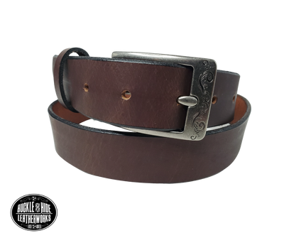 "The Central City" handmade, real leather belt is made in our Smyrna, TN shop just outside Nashville.  The process starts with cowhide, which is cut into strips. The removable antique silver colored buckle is attached with snaps, you may add your own or purchase a theme buckle to personalize the look.  Please see sizing instructions to make sure you have the desired fit. 
