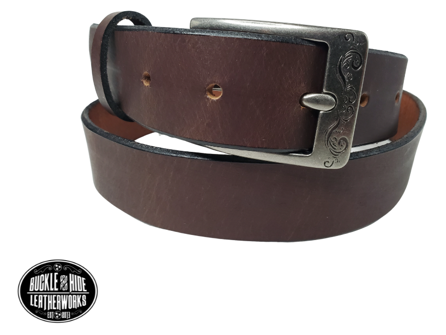 "The Central City" handmade, real leather belt is made in our Smyrna, TN shop just outside Nashville.  The process starts with cowhide, which is cut into strips. The removable antique silver colored buckle is attached with snaps, you may add your own or purchase a theme buckle to personalize the look.  Please see sizing instructions to make sure you have the desired fit. 