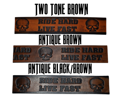 "The Daytona" is a handmade real leather belt made from a single strip of cowhide shoulder leather that is 8-10 oz. or approx. 1/8" thick. It has hand burnished (smoothed) edges and features the mantra "RIDE HARD LIVE FAST" and an HD Skull pattern down the center. This belt is completely HAND dyed with a multi step finishing technic. The antique nickel plated solid brass buckle is snapped in place with heavy snaps.  This belt is made just outside Nashville in Smyrna, TN.