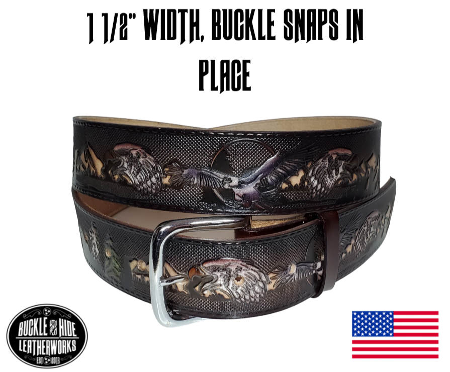 This USA made veg-tan leather belt is approx. 1/8" thick, 1 1/2"width with no fillers to split or rip apart. The belt features a scene of a Eagles framed with a outdoors pattern  around the entire belt. The leather is comfortable from day one   Buckle is snapped on for easy buckle change. Colors may vary do to the manufacturing process. We don't make this belt but it's Buckle and Hide approved and still made in the USA. There is not a NAME option on this belt