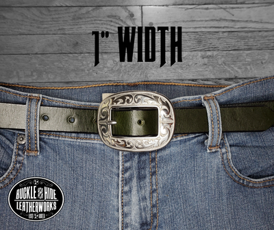 Our ladies 1" wide Deep Green water buffalo leather belt with snaps to easily change out buckle. Features a smoothed black burnished and a oval shaped Stainless steel buckle with Western floral pattern around it's oval shape. The buckle size is 3" across x 2 1/4" tall. This belt has a softer feel than some of our Name style belts but still durable. Available online or for purchase at our shop just outside Nashville in Smyrna, TN.