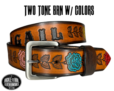 "The Heirloom Rose" is a handmade real leather belt made from a single strip of cowhide shoulder leather that is 8-10 oz. or approx. 1/8" thick. It has hand burnished (smoothed) edges and summer flowers embossed on the surface and with most HAND PAINTED in Pink, White, Yellow, Red and Turquoise. The antique nickel plated solid brass buckle is snapped in place with heavy snaps.  This belt is made just outside Nashville in Smyrna, TN.