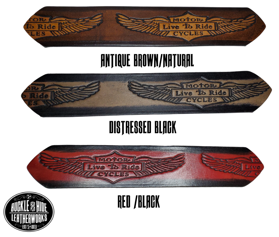 "The SGT AT Arms" is a handmade real leather belt made from a single strip of cowhide shoulder leather that is 8-10 oz. or approx. 1/8" thick. It has hand burnished (smoothed) edges and the Classic Wings and Shield pattern down the center. This belt is completely HAND dyed with a multi step finishing technic. The antique nickel plated solid brass buckle is snapped in place with heavy snaps.  This belt is made just outside Nashville in Smyrna, TN.