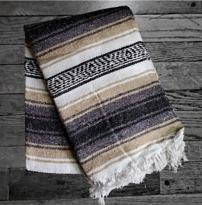 Mexican Falsa Blanket. A classic that's been around for years, great for a couch throw, or snuggling up with your significant other to watch a movie on a cool evening. Works well to wrap up on your motorcycle in a leather wrap too. Made in Mexico from acrylic yarn. Available at our Smyrna, TN shop only.  Aprrox. Size 5' x 7'