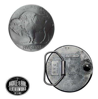 The classic and very popular Buffalo nickel is a five-cent piece that was struck by the United States Mint from 1913 to 1938. It was designed by sculptor James Earle Fraser. D, S. Centered under "FIVE CENTS" on the reverse on round shaped buckle. This pewter belt buckle that may be attached to your belt.  Fits 1 1/2" belts, Size 3-1/2" x 2-3/4. Available in our shop just outside Nashville in Smyrna, TN.