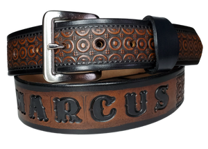 "The Bullock" is a handmade real leather belt made from a single strip of cowhide shoulder leather that is 8-10 oz. or approx. 1/8" thick. It has hand burnished (smoothed) edges and a Western Circle pattern. This belt is completely HAND dyed with a multi step finishing technic. The antique nickel plated solid brass buckle is snapped in place with heavy snaps.  This belt is made just outside Nashville in Smyrna, TN.
