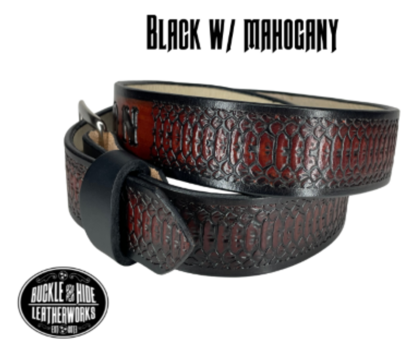 "The Rattler" is a handmade real leather belt made from a single strip of cowhide shoulder leather that is 8-9 oz. or approx. 1/8" thick. It has smoothed edges and the Serpent pattern embossed on the surface. The antique nickel plated solid brass buckle is snapped in place.  This belt is made just outside Nashville in Smyrna, TN.