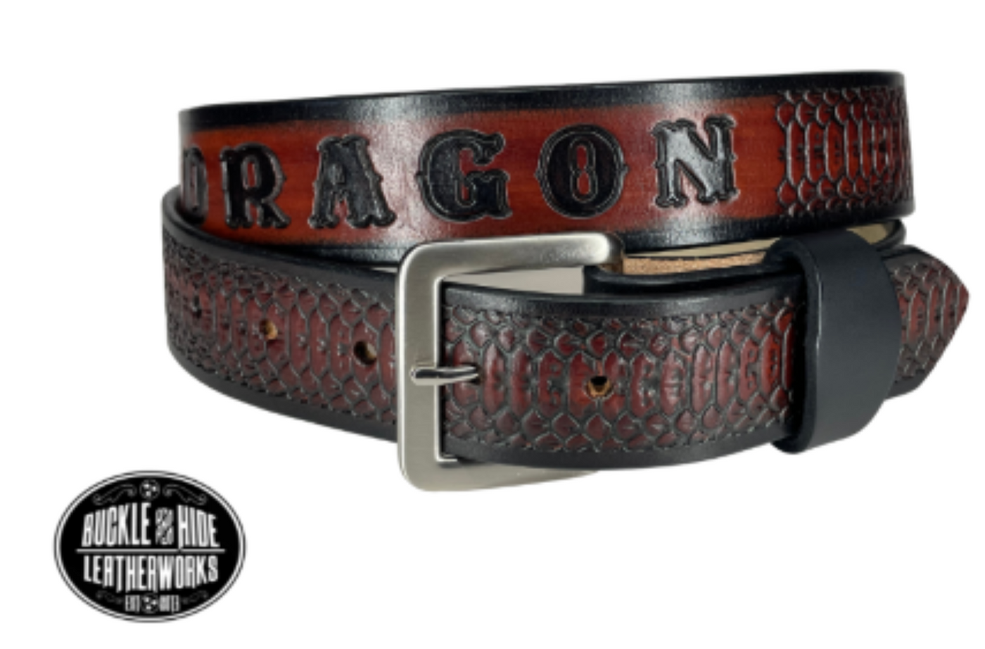 "The Rattler" is a handmade real leather belt made from a single strip of cowhide shoulder leather that is 8-9 oz. or approx. 1/8" thick. It has smoothed edges and the Serpent pattern embossed on the surface. The antique nickel plated solid brass buckle is snapped in place.  This belt is made just outside Nashville in Smyrna, TN.