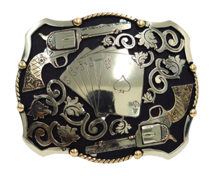 The Card Shark buckle features a Dead Man's Hand accented by Western scroll work and Peacemakers. Augus buckles are made from German Silver (nickel and brass alloy) or iron metal base. Some buckles have motifs made of copper, iron or brass. Each piece is punched, cut, soldered, engraved, polished and painted by our talented metal workers. Available at our Smyrna, TN location.