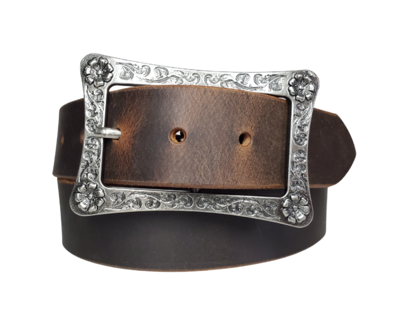This rustic leather belt is made from Crazy Horse tanned leather for that distressed and used look. The edges are beveled and burnished leaving the natural color for a contrasting appearance. It has a Center Bar style buckle with a Western influenced scroll pattern. Buckle is antique nickel plated and snaps in place, for an easy buckle change giving it a totally different look. Belt is 1 1/2" wide and available in lengths from 32" to 44".  It is handmade in our shop in Smyrna, TN, just outside of Nashville.