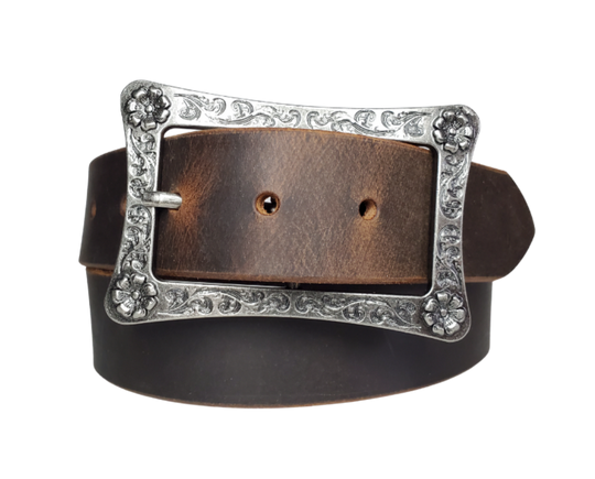 This rustic leather belt is made from Crazy Horse tanned leather for that distressed and used look. The edges are beveled and burnished leaving the natural color for a contrasting appearance. It has a Center Bar style buckle with a Western influenced scroll pattern. Buckle is antique nickel plated and snaps in place, for an easy buckle change giving it a totally different look. Belt is 1 1/2" wide and available in lengths from 32" to 44".  It is handmade in our shop in Smyrna, TN, just outside of Nashville.