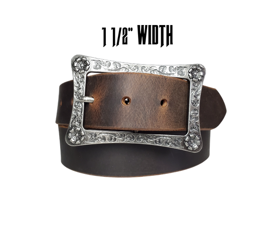 This rustic leather belt is made from Crazy Horse tanned leather for that distressed and used look. The edges are beveled and burnished leaving the natural color for a contrasting appearance. It has a Center Bar style buckle with a Western influenced scroll pattern. Buckle is antique nickel plated and snaps in place, for an easy buckle change giving it a totally different look. Belt is 1 1/2" wide and available in lengths from 32" to 44".  It is handmade in our shop in Smyrna, TN, just outside of Nashville.