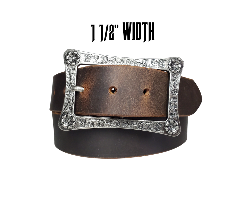 This rustic leather belt is made from Crazy Horse tanned leather for that distressed and used look. The edges are beveled and burnished leaving the natural color for a contrasting appearance. It has a Center Bar style buckle with a Western influenced scroll pattern. Buckle is antique nickel plated and snaps in place, for an easy buckle change giving it a totally different look. Belt is 1 1/2" wide and available in lengths from 32" to 44".  It is handmade in our shop in Smyrna, TN, just outside of Nashville.