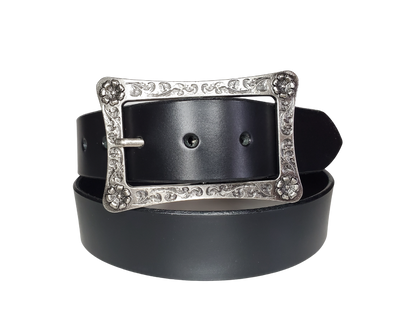 This Solid Black leather belt is made from Drum dyed cowhide that is long lasting but still nice enough for a night out. .The edges are beveled and painted for a finished look. It has an Western influenced scroll pattern with a antique nickel plated buckle that is snapped in place. Belt is 1 1/2" wide and available in lengths from 32" to 44".  It is handmade in our shop in Smyrna, TN, just outside of Nashville.