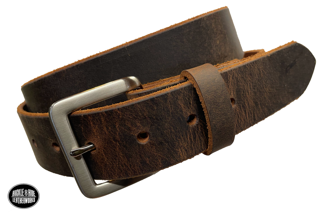 This brown leather belt is made from Crazy Horse tanned leather for that distressed and pull-up look. The edges are beveled and left raw for a contrasting look. It has an antique nickel coated solid brass buckle that is snapped in place. Belt is 1 1/2" wide and available in lengths from 34" to 44".  It is handmade in our shop in Smyrna, TN, just outside of Nashville. 