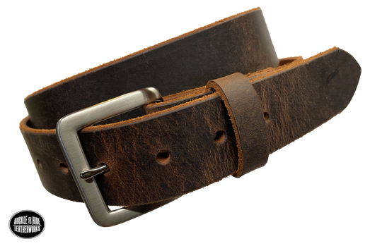 This brown leather belt is made from Crazy Horse tanned leather for that distressed and pull-up look. The edges are beveled and left raw for a contrasting look. It has an antique nickel coated solid brass buckle that is snapped in place. Belt is 1 1/2" wide and available in lengths from 34" to 44".  It is handmade in our shop in Smyrna, TN, just outside of Nashville. 