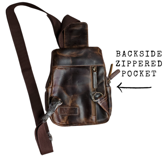 Great for being a on the go minimalist type. Durable Distressed leather is great for everyday use. A small sling style with a outside zippered pocket on the backside on the front. 3 Full sized pockets on the inside front 2 of are zippered large enough for most phones and a small wallet plus all your everyday carry items. Available also in our Smyrna ,TN shop just outside Nashville. Product made in India.