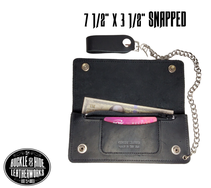 This is the Original Chain Wallet, great for the Modern minimalist. One credit card slot in the front with 2 main cash or whatever your STUFF is....5 year old receipts, concert stub from high school, the stuff you forgot was in there!  Made in USA 2 main Cash compartments 1 card slot Complete with 12" chain  Dimensions: 7 1/2" x 4" folded, 7 1/2" x7 1/2" opened