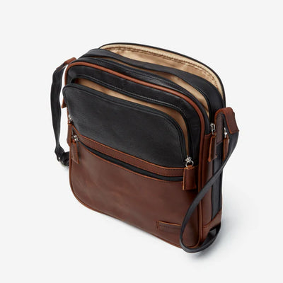 Size: 12 x 12.5 Soft Genuine cowhide leather from Argentina Single adjustable shoulder strap Brushed nickel zippers  Front features deep zippered pocket with open storage with two multi-function pocket, two pen holders. Zippered pocket below for additional storage. Main zippered compartment with large open storage.   Back zippered compartment with pocket for IPAD and zippered pocket on the back wall with RFID lining to protect against anti-thieft. This style has beautiful Espresso and Rugby leather