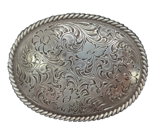 This oval shaped buckle by Nocona has a rope design around the border. It is chrome colored with scroll design etched appearance on surface.  Measures 2 3/4" tall by 3 3/4" wide and fits belts up to 1 1/2" wide.  It is available for purchase in our retail shop in Smyrna, TN, just outside Nashville and also on our online store. Made in Taiwan.
