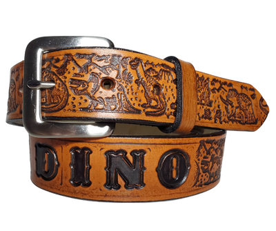 Our Lil Dino is perfect who love Dinosaurs! Full grain American vegetable tanned cowhide approx. 1/8"thick. Width is 1 1/4" and includes Antique Nickle plated Solid Brass buckle. We Hand Finish with each belt. Edges are smooth burnished painted edges. Made in our Smyrna, TN, USA shop. Buckle snaps in place for easy changing if desired.  Choose with or without name