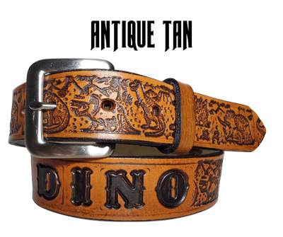 Our Lil Dino is perfect who love Dinosaurs! Full grain American vegetable tanned cowhide approx. 1/8"thick. Width is 1 1/4" and includes Antique Nickle plated Solid Brass buckle. We Hand Finish with each belt. Edges are smooth burnished painted edges. Made in our Smyrna, TN, USA shop. Buckle snaps in place for easy changing if desired.  Choose with or without name