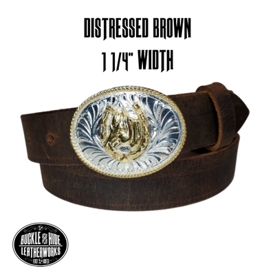 Our Kids/Youth Belt Combo is a great choice who's wants to be like dad or mom! Full grain Distressed Brown Water Buffalo or Black cowhide leather that is approx. 1/8"thick. The width is 1 1/4" and this Combo includes a 2" x 2 1/2" sized Western styled Nickle plated oval shaped buckle with a Horsehead framed in a Horseshoe completed with a rope edge. Buckle snaps in place for easy changing if desired. Choose a Black or Distressed Brown Leather belt for the Combo. Made in our Smyrna, TN, USA shop.    